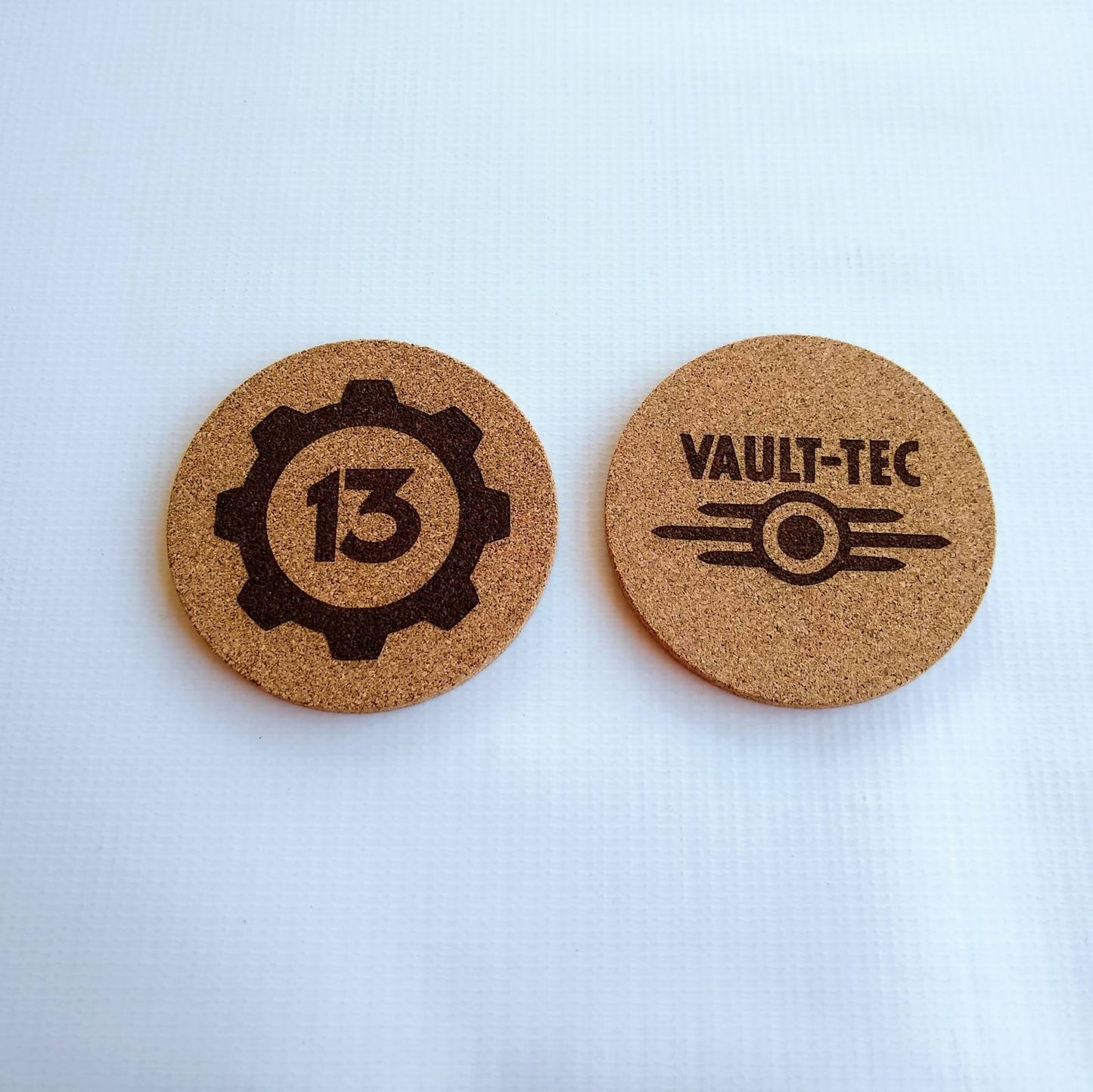 Fallout Game 4 inch Round Cork Coasters, with Vault 13 and Vault Tec symbol.