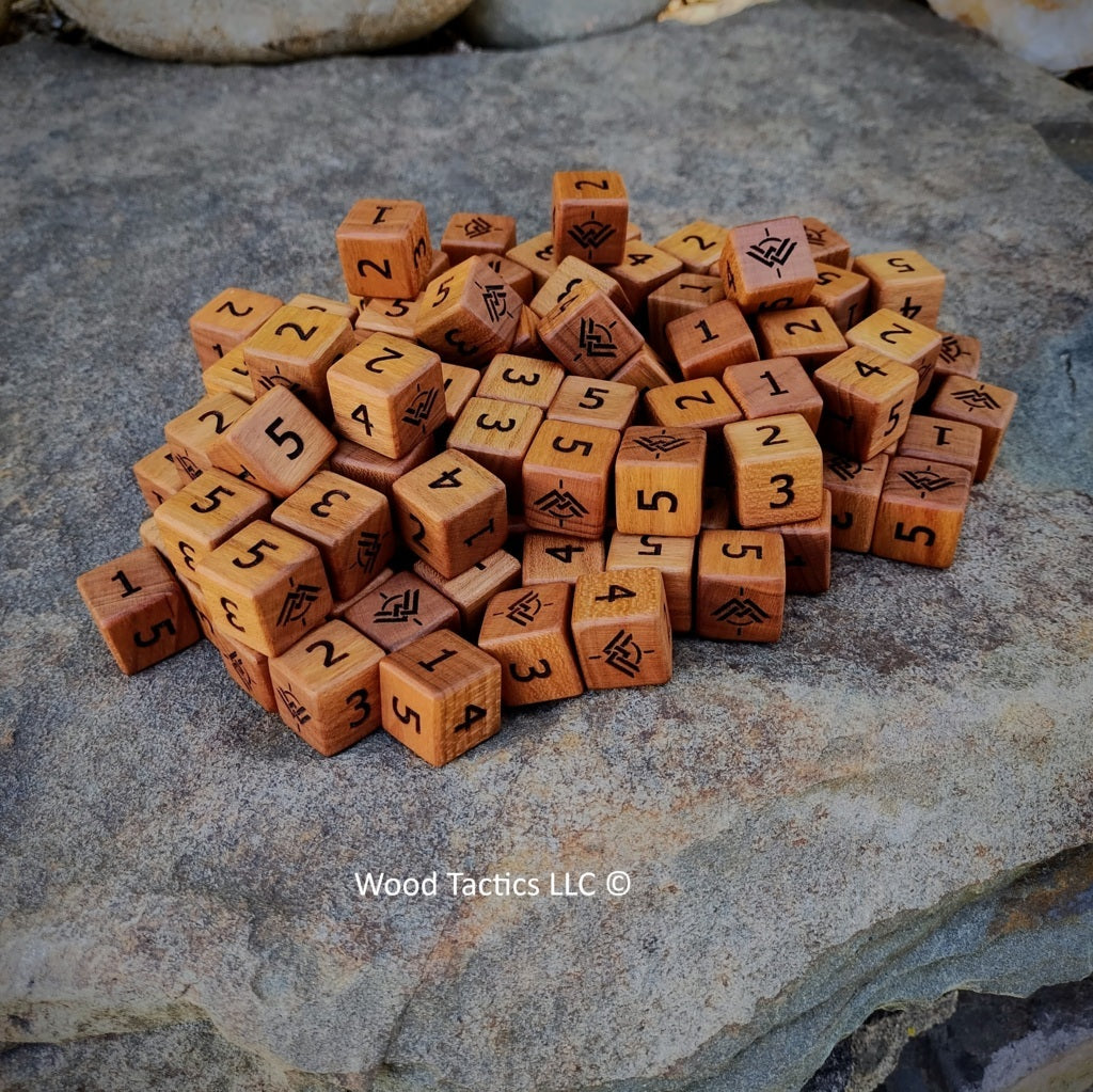 Custom d6 Dice made for the WorldsWithing RPG Kickstarter, made from Cherry.