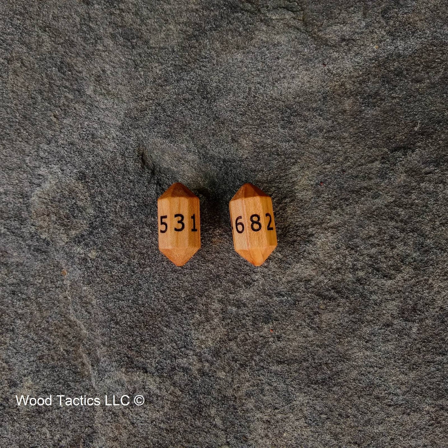 Cherry Hardwood Barrell D8 Dice with Numbers Symbols.
