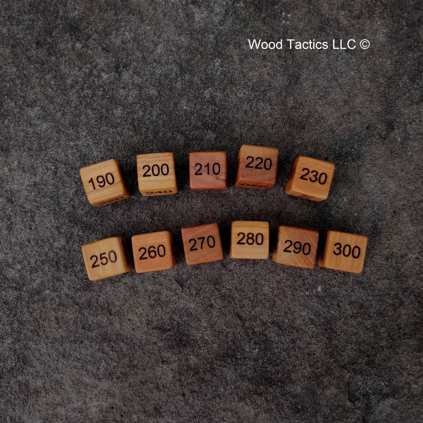 D6 Damage Counter Dice for Pokémon TCG made from Variegated Cherry Hardwood, Counting in the 10's going from 300 to 10