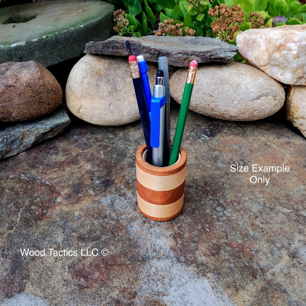 Small Maple and Cherry Hardwood pencil cup with foam lining, striped design. With Pencils and Pens.