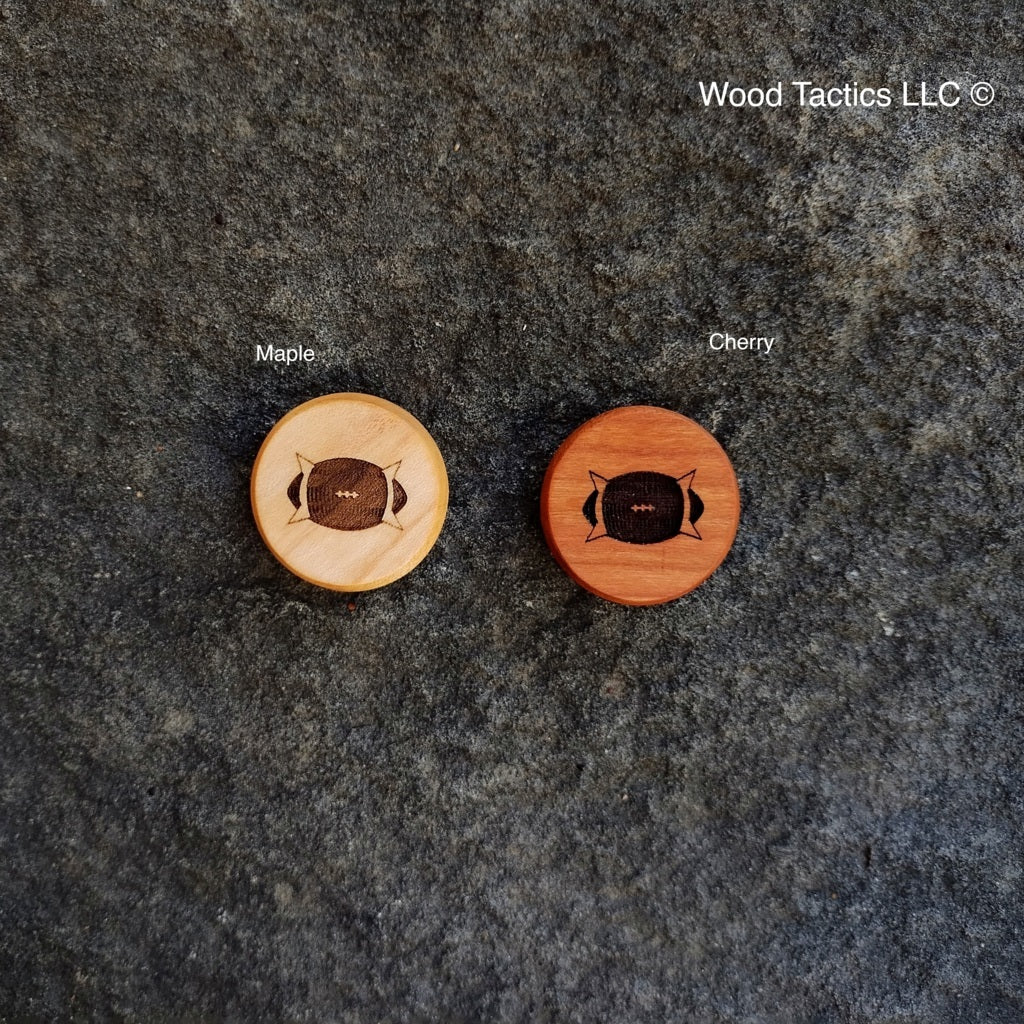 Spiked Football Marker made from Maple and Cherry Hardwood. Can be used as a ball marker for Blood Bowl or as a generic token.