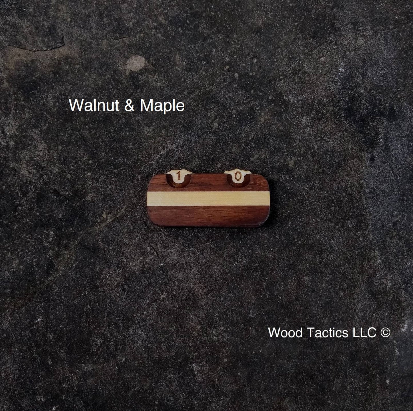 Made from Walnut and Maple hardwood in a striped pattern, our Two Dial Tracker helps you track Mana Points, and more.