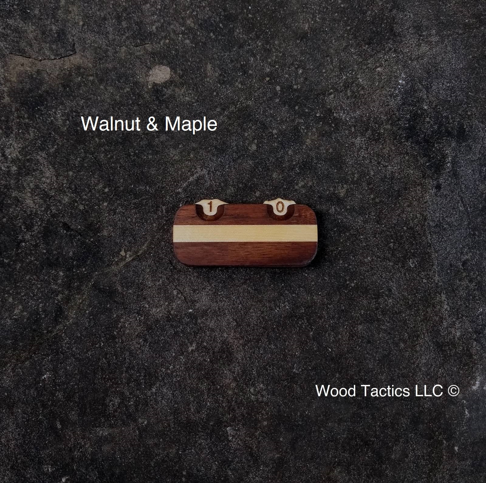 Made from Walnut and Maple hardwood in a striped pattern, our Two Dial Tracker helps you track Mana Points, and more.