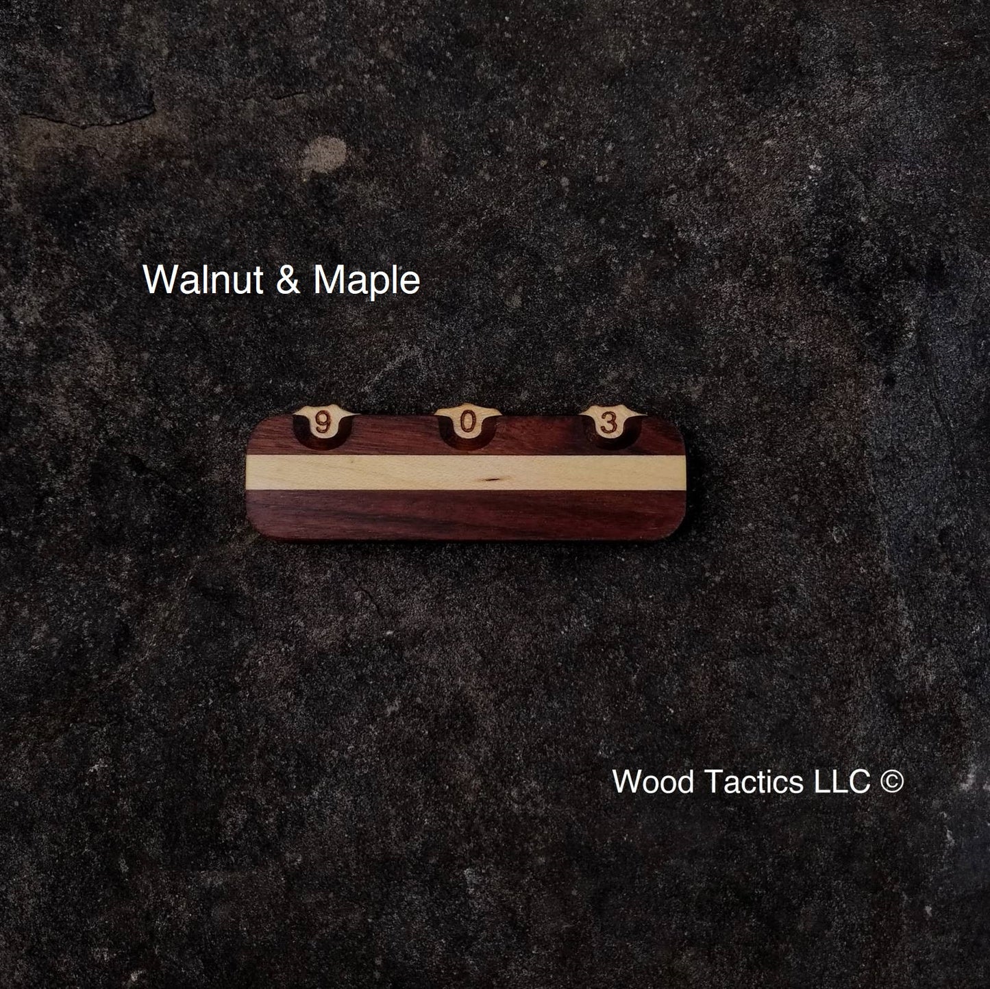 Handcrafted from Walnut and Maple hardwood in a striped pattern, our Three Dial Tracker can track Events, Damage, and more.