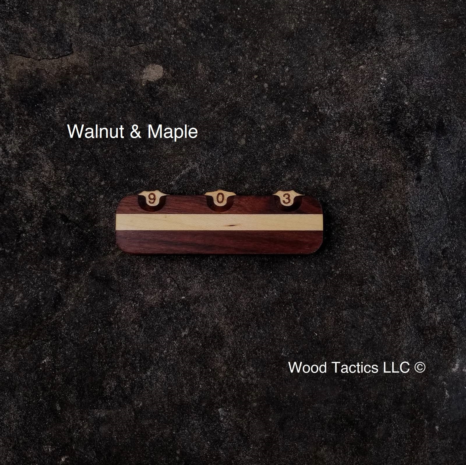 Handcrafted from Walnut and Maple hardwood in a striped pattern, our Three Dial Tracker can track Events, Damage, and more.