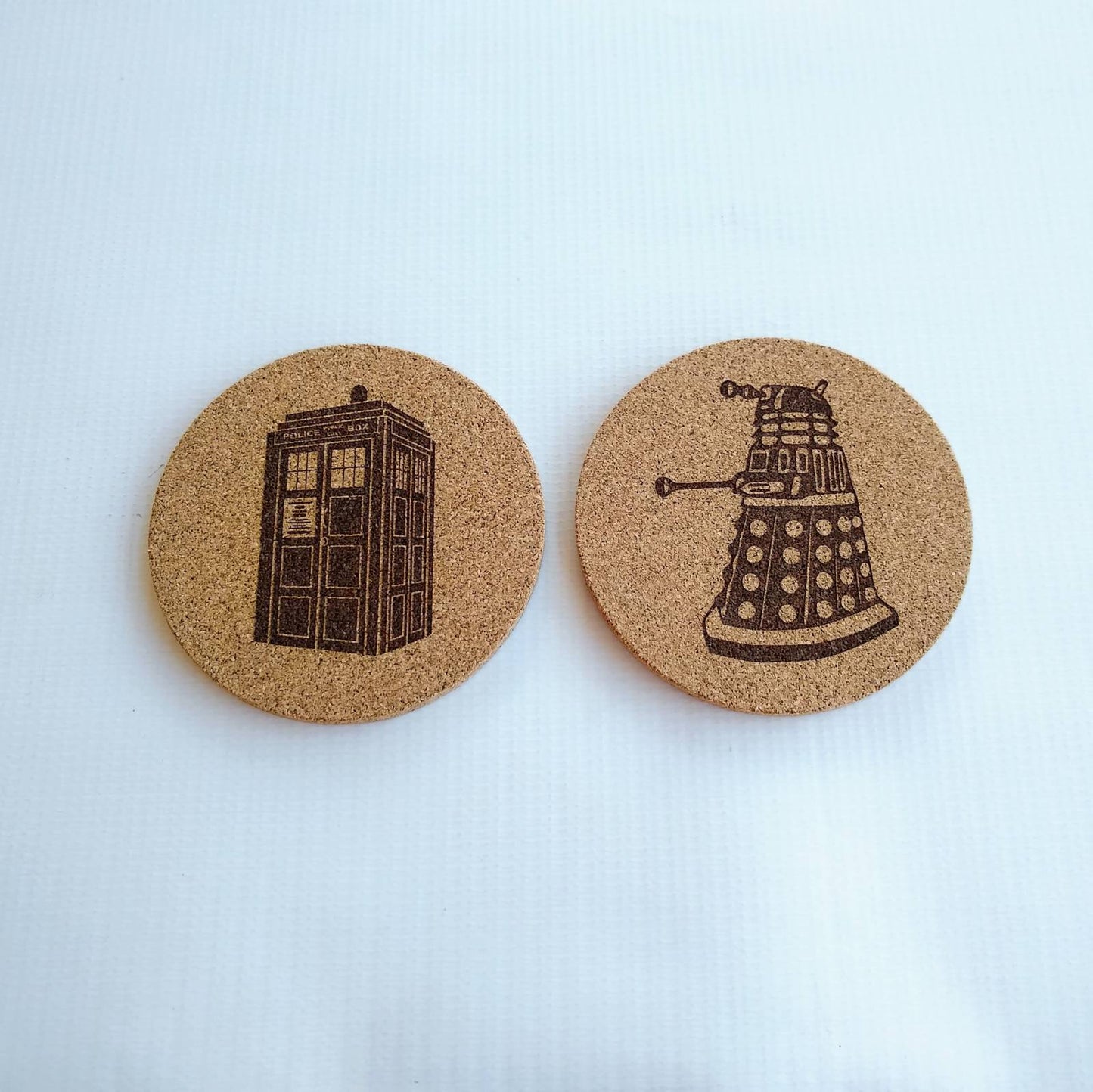 DR Who 4 inch Round Cork Coasters, with Dalek, and Tardis.