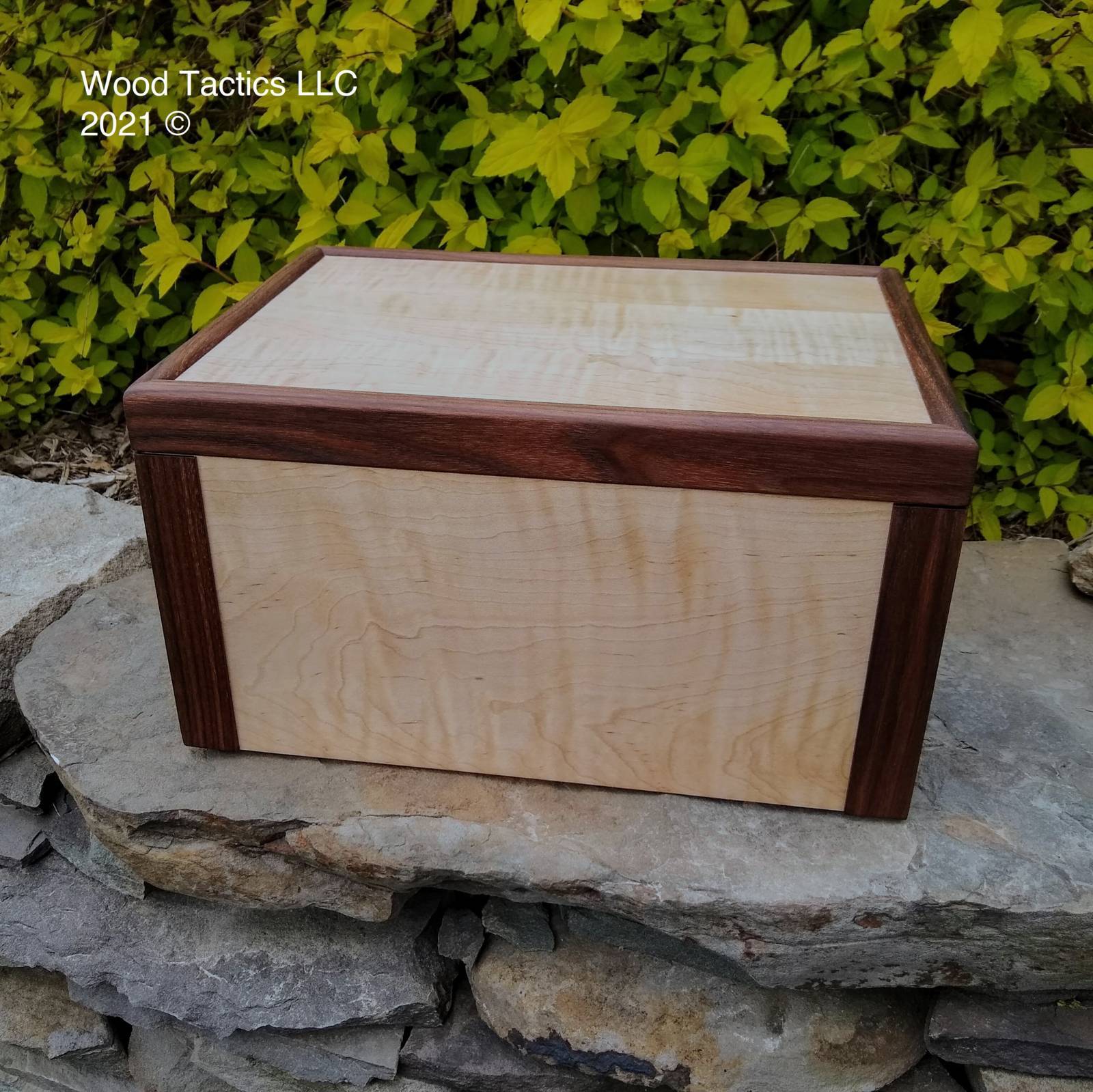 Custom JewelryBox made from curly maple and walnut edging.