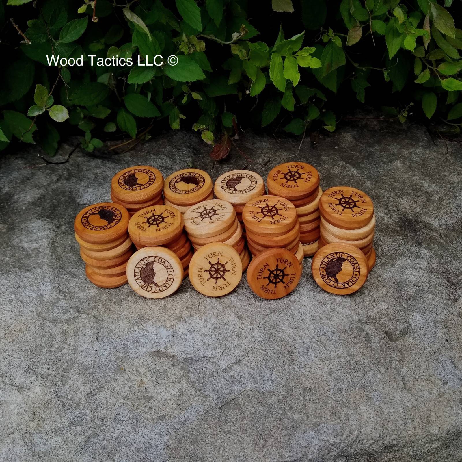 30mm Round tokens made from Cherry and Maple Hardwood. Made for the ACC Tournament with a ships wheel.