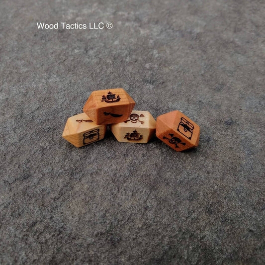 Various Hardwood Barrel D4 dice for the bluffaneer game. Symbols are Pirate Ship, Skull and Pones, Treasure Chest and Sword.
