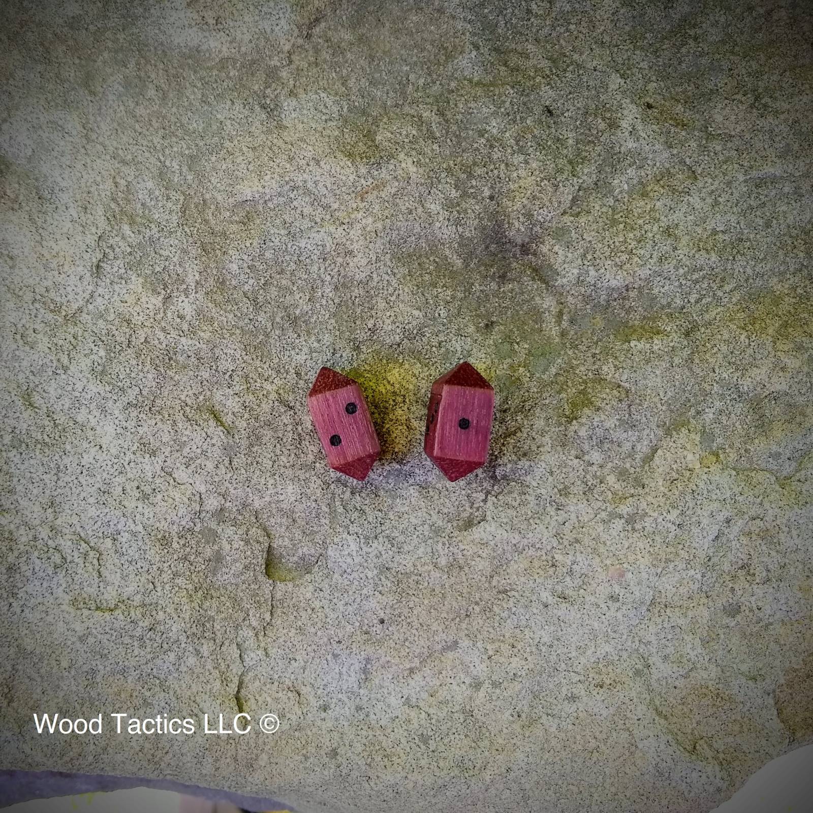 Purple Heart Hardwood Barrell D4 Dice with Pips without ink.
