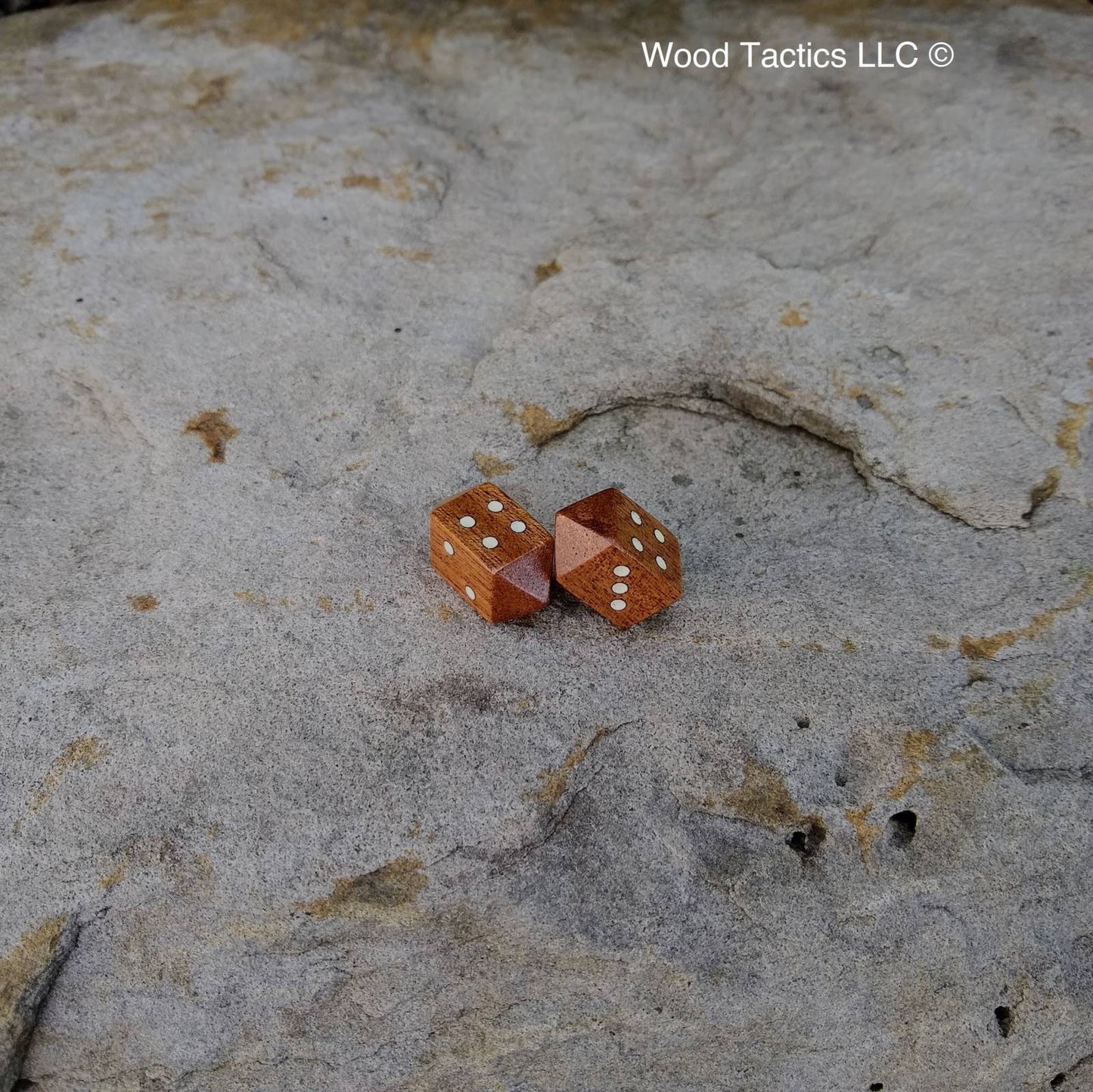 Sapele Hardwood Barrell D4 Dice with Pip symbols. inked in white.