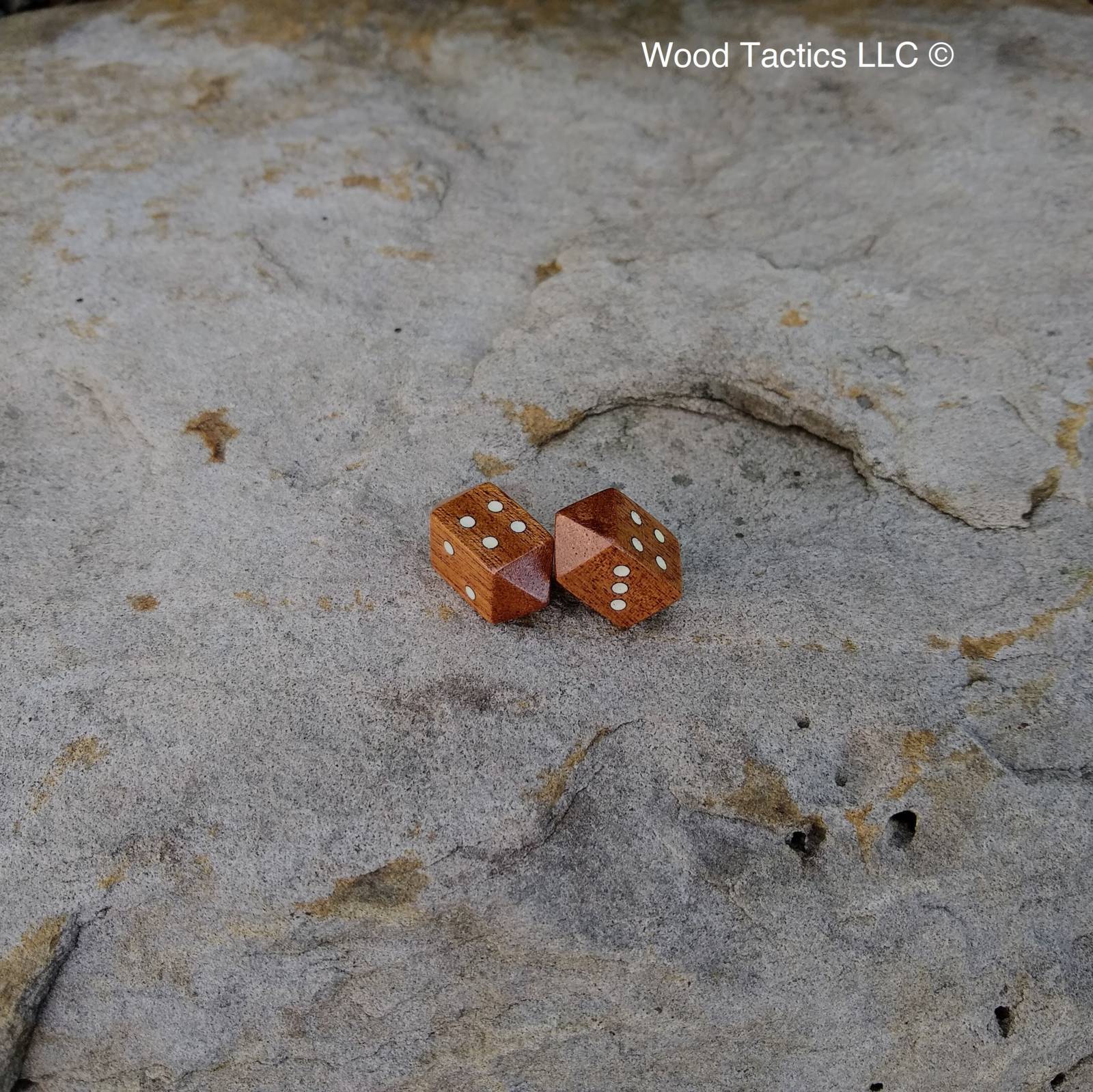 Sapele Hardwood Barrell D4 Dice with Pip symbols. inked in white.
