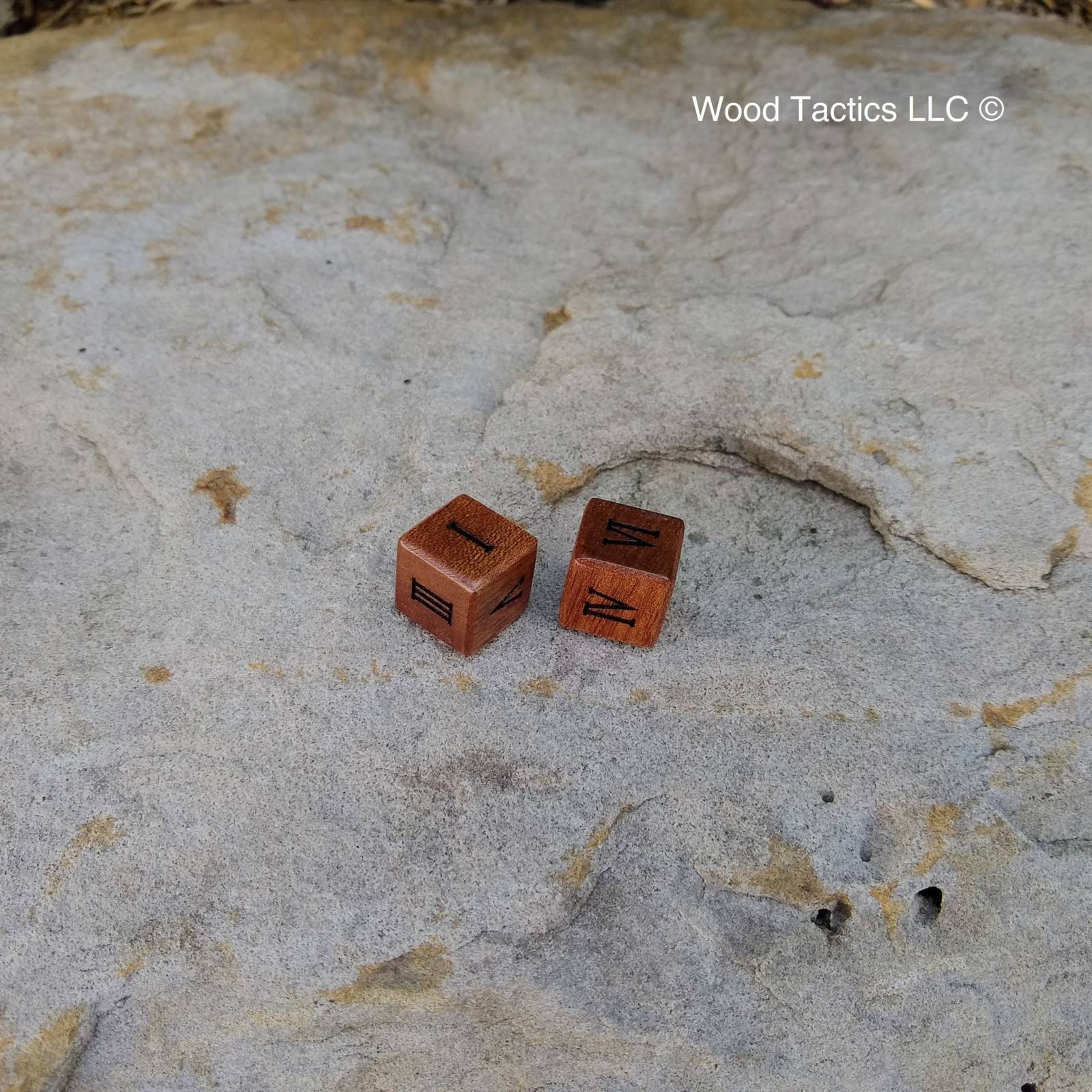 Sapele Hardwood D6 dice with Roman Numerals, and without ink.