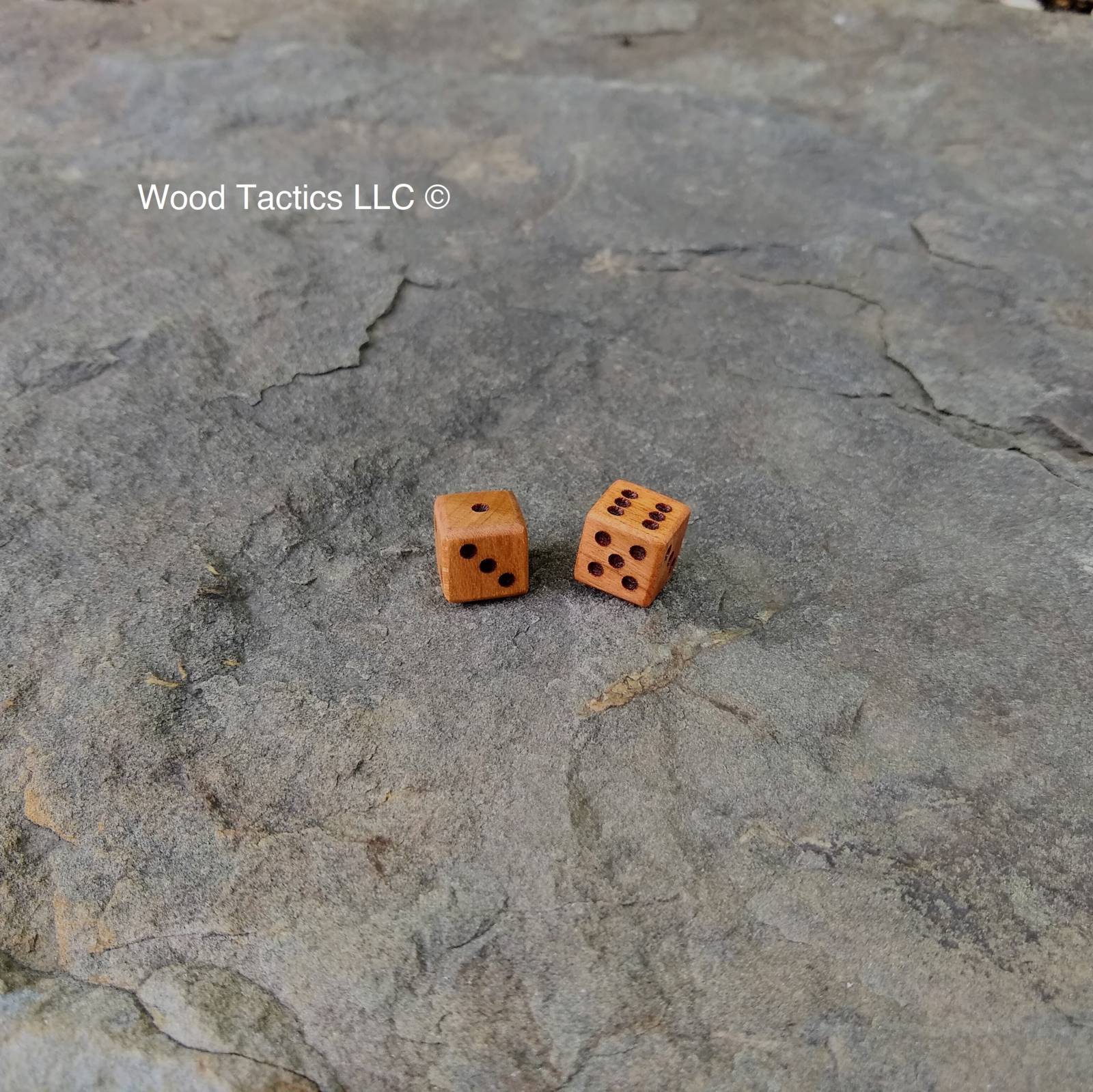 Cherry Hardwood D6 12mm in size Dice with Pip Symbols.
