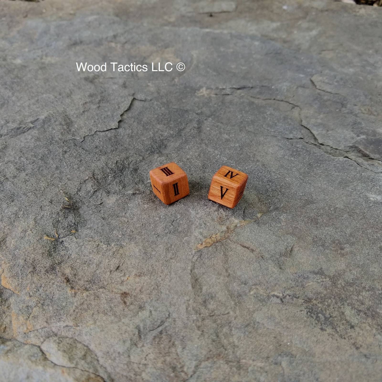 Cherry Hardwood D6 12mm in size Dice with Roman Numerals Symbols.