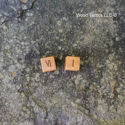 Maple Hardwood D6 16mm in size Dice with Woman Numerals. End Grain View.
