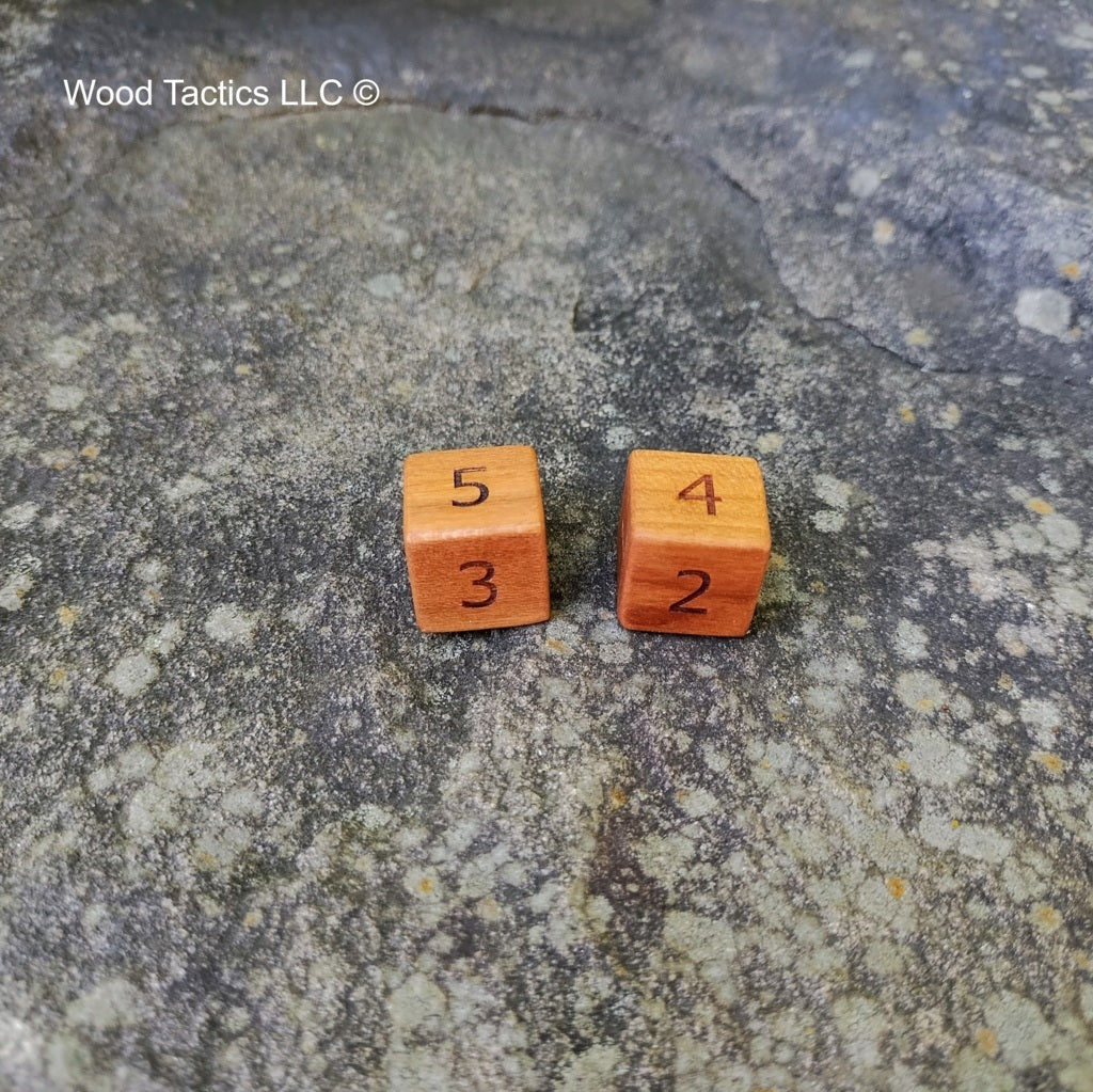 Cherry Hardwood D6 16mm in size Dice with Numbers Symbols.  Face Grain View.