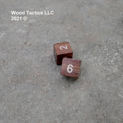 Walnut Hardwood D6 16mm in size Dice with Numbers Symbols. Symbols are inked in white.