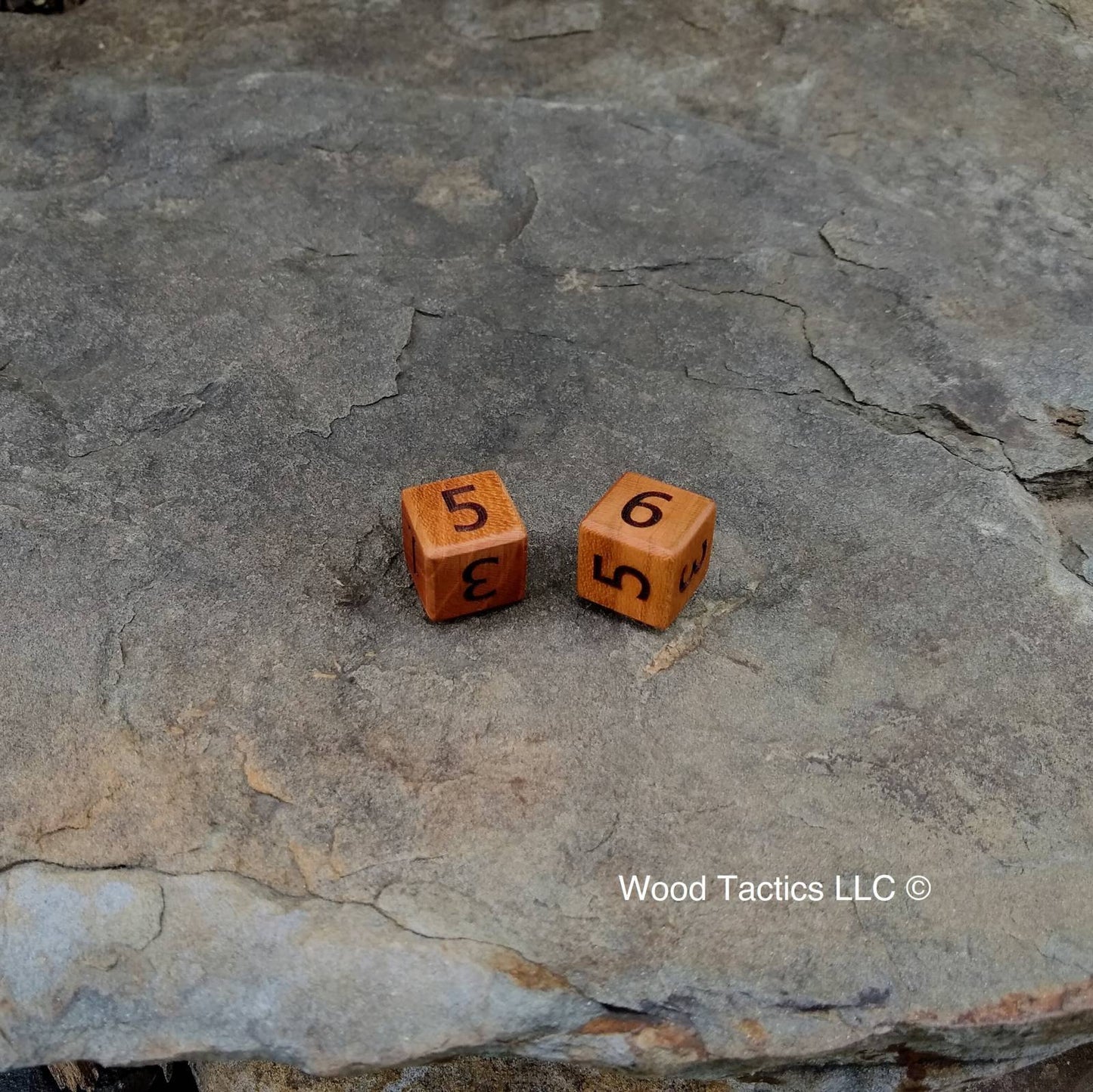 Cherry Hardwood D6 19mm in size Dice with Number Symbols. 
