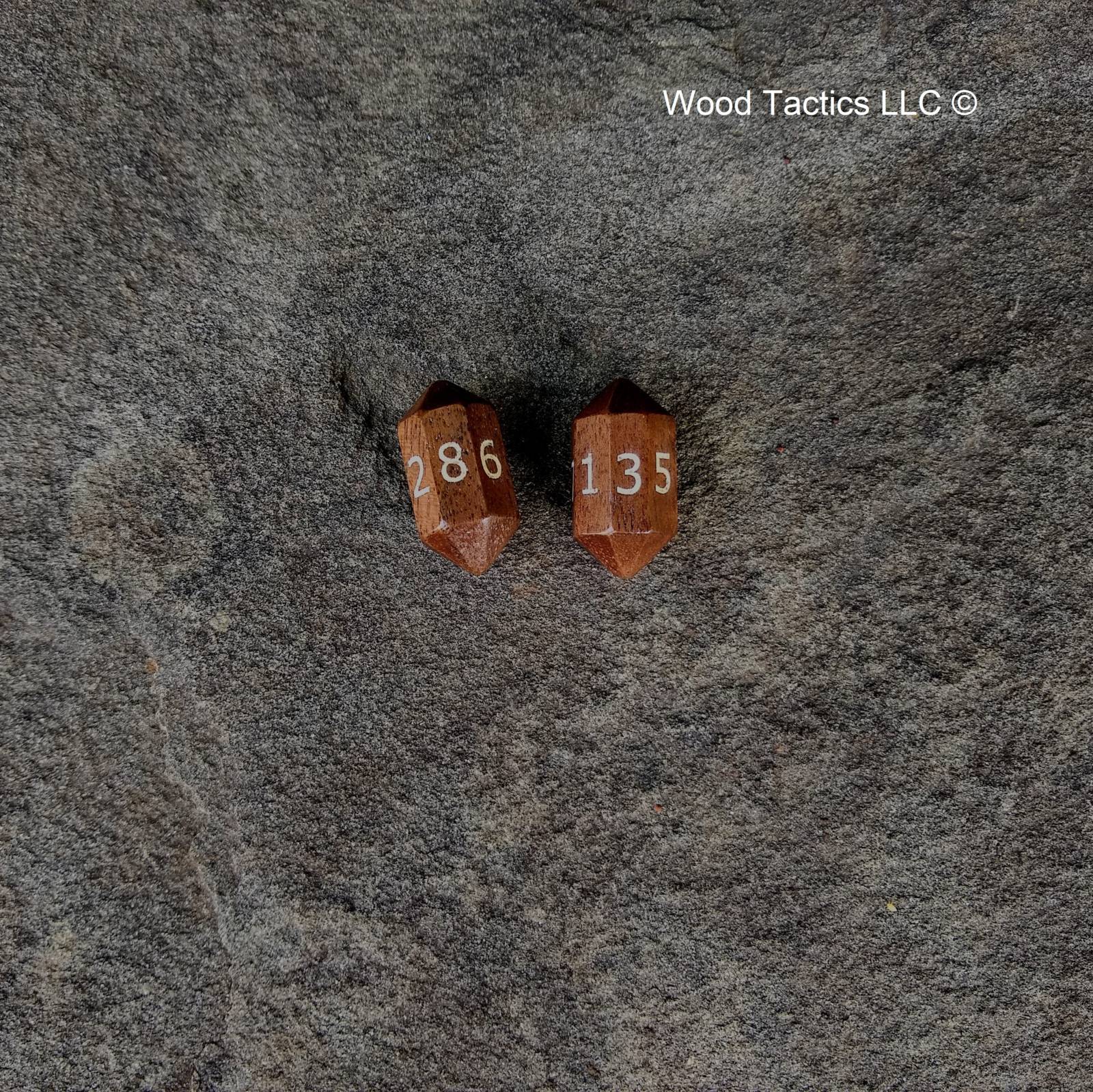 Walnut Hardwood Barrell D8 Dice with Numbers Symbols. Symbols are inked in white.