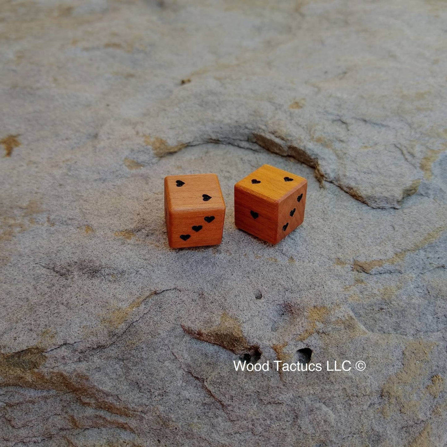 Cherry Hardwood D6 dice with heart shaped pips.