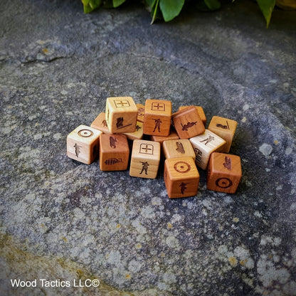 Various Hardwood Memoir 44 game dice, with faction symbols for Italy and France.