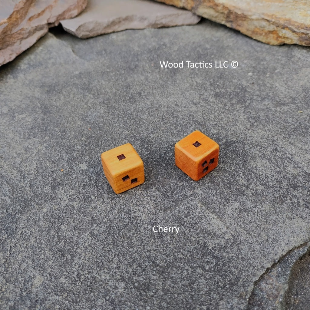 Small World Board Game dice made from cherry hardwoods with blank, single square, double square and triple square sides.