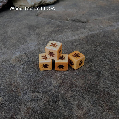 Maple hardwood d6 dice with intricate tree leaf designs: dogwood, oak, maple, hickory, walnut & cherry leaves.