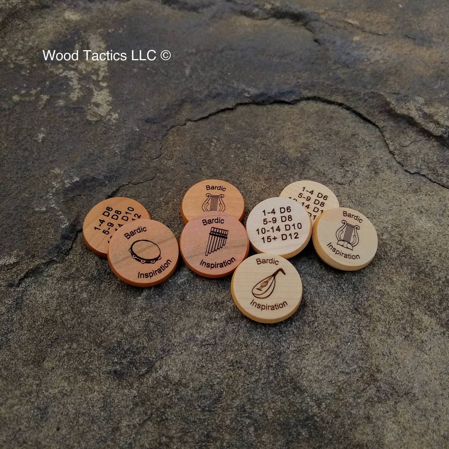 DnD 5e Bardic Inspiration Tokens made from Maple and Cherry Hardwood. Featuring Lute, Flute, Lyre and Drum with Dice pattern.