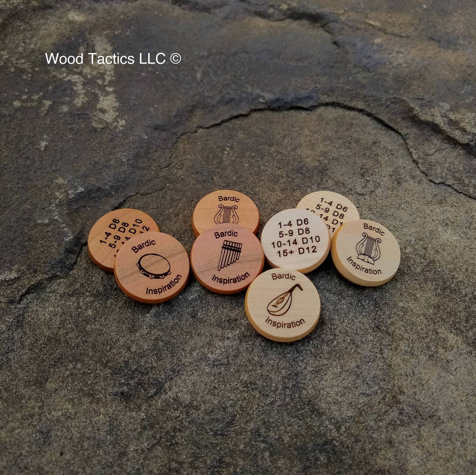 DnD 5e Bardic Inspiration Tokens made from Maple and Cherry Hardwood. Featuring Lute, Flute, Lyre and Drum with Dice pattern.