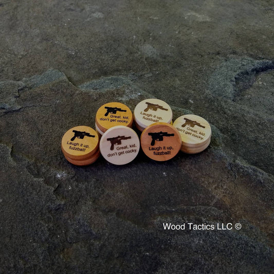Han Solo Hardwood game token with laser pistol and "Laugh it up, fuzzball!" and "great, kid, don't get cocky" quotes.