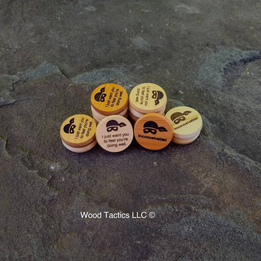 Princess Bride Maple and Cherry Hardwood game token with "Inconceivable!" and "I just want you to feel you're doing well".
