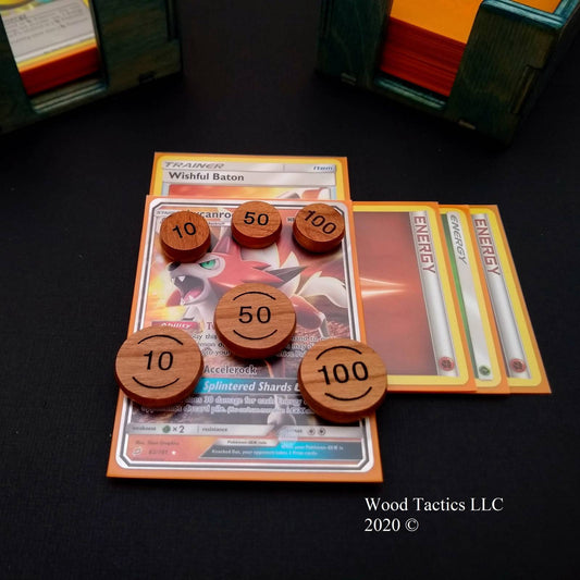 Pokémon TCG Damage Tokens, made from Cherry Hardwood. Featuring 10 and 50 numbers and 50 and 100 numbers. In 15 and 20mm size.