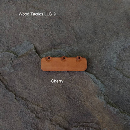 Crafted from Cherry hardwood, our sleek Three Dial Tracker helps you track hit points, status rounds, and more.