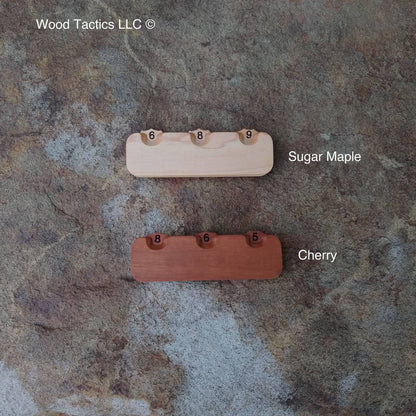 Crafted from various hardwoods, our sleek Three Dial Tracker helps you track hit points, status rounds, and more.